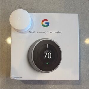 Google Smart Thermostat in Black and White
